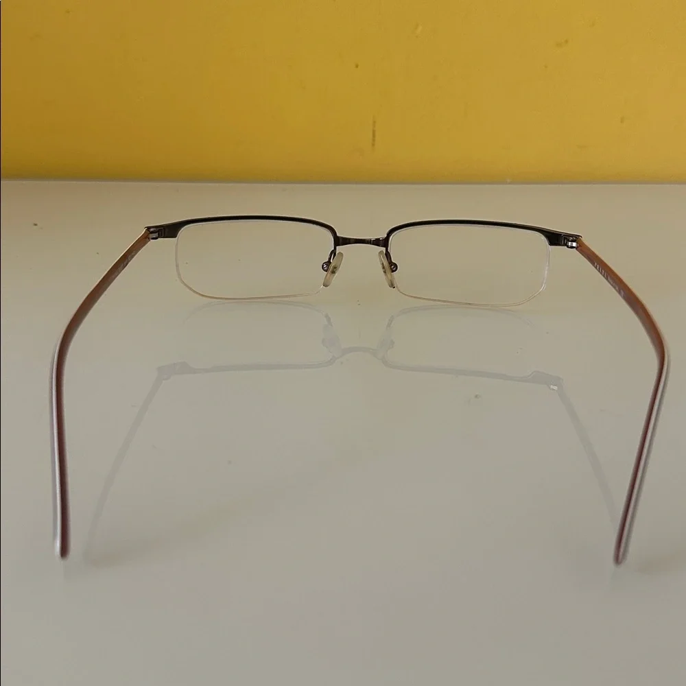 Prada Sleek Bronze Titanium Frameless Rectangular Prescription Glasses Frame